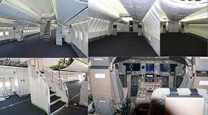 Seat was one of the newly 'designed' seats to maximize room through reduction of seat width, resulting in absolutely no ergonomic support to lower back. Boeing 747 Green Interior