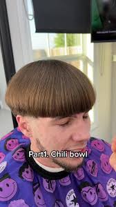 Bowl Cut and Gold Hoop Earrings: A 90s Inspired Look