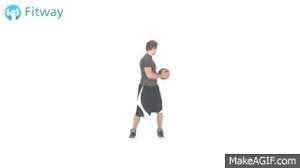 A kneeling medicine ball overhead pass places a greater load on the upper body and core than a standing pass. How To Do Medicine Ball Twist Russian Standing Ab Workout Exercise On Make A Gif