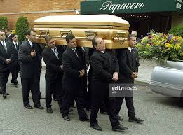 The Body Of Former Mob Boss John Gotti Is Carried From Papavero Mafia Mafia Gangster Crime Family