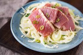 Season one side of the tuna with salt and pepper to taste and coat with sesame seeds.repeat on the opposite side. Seared Ahi Tuna Recipe