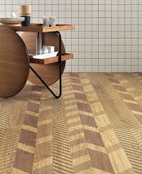 Dark, light, brown, and red, wood look tiles come in all kinds of hues and shades. New Line Floor And Wall Tiles Design By Diego Grandi Interiorzine