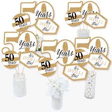Get an anniversary party theme that represents your couple's unique relationship. We Still Do 50th Wedding Anniversary Anniversary Party Centerpiece Sticks Table Toppers Set Of 15 Walmart Com Walmart Com