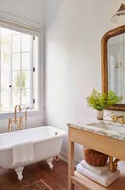 Mix in some small earthy accents like baskets, wooden side tables, and vintage rugs. Drool Worthy Home With A Rustic Farmhouse Vibe In Southern California