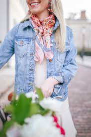 To create this look, start by rolling your scarf diagonally. How To Wear A Denim Jacket In Summer Rhyme Reason