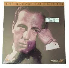 Ava Gardner as Maria Vargas and Humphrey Bogart as Harry Dawes in