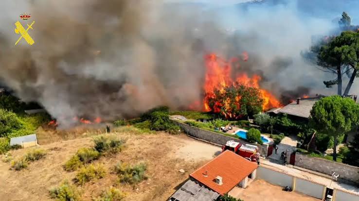 Tens of thousands flee fires in France, blazes merge outside Madrid | Cyprus Mail