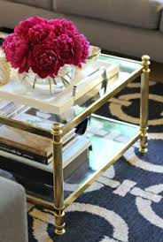 This table has a pretty gold base and light marbled top which basically begs for those fashion books. 41 Gold Coffee Tables Ideas Home Decor Gold Coffee Table Decor