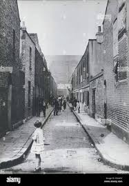 Jan. 01, 1920 - London In The Twenties. Street scene in Limehouse, East  London. (exact date unknown) ne P Stock Photo - Alamy