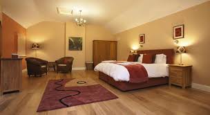 Paint colors for bedroom with dark furniture and white curtains. 10 Easy Tips For Brightening The Darkest Rooms Of Your Interiors