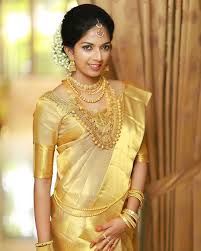 Kerala Bride In Gold Kerala Wedding Saree Set Saree Kerala Saree Blouse