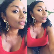 This is so dope! “Superwoman” Karyn White sent this pic to us, rocking' our  Crescent Moon 🌙 earrings. 🔥🔥 https://grittysoul.com/GQ0S3J5cfsMXtvn  #payinghomagetothevinyl #grittysoul ⚡️grittysoul.com ⚡️