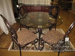 Black Iron Dining Table With 48 Scalloped Edge Glass Top And Four 4 Metal Chairs With Tan Seating Perfect For Y Glass Dining Room Table Metal Chairs Chair