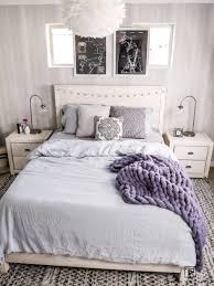 Little boy and girl, brother and sister play on the bed wearing pajamas. Blue Girls Bedroom Decor Taryn Whiteaker