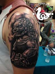 Black And Grey Dog Tattoo Dog Tattoo Fu Dog Lion Dog Tattoo Tattoo Ideas Traditional Tattoos Foo Dog Tattoo Foo Dog Tattoo Design Tattoos