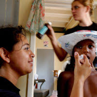 US Air Force (USAF) STAFF Sergeant (SSGT) Enoch Daniels, with the 6th  Medical Group (MG), gives a flu vaccination using a biojector to STAFF  Sergeant (SSGT) Monica Figueroa, from the 6th Comptroller