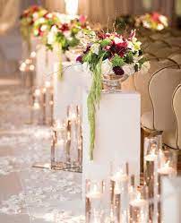 We wanted people to walk in and be floored. Love This Classy Candles And Flower Ceremony Aisle Design Ceremony Wedding Ceremony Flower Arrangements Wedding Aisle Decorations Wedding Ceremony Flowers