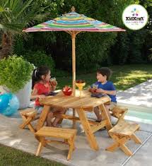 Kidkraft is a leading creator, manufacturer and distributor of children's furniture, toys, gifts and room accessories. Amazon Com Kidkraft Octagon Table 4 Stools And Multi Striped Umbrella Toys Games Octagon Table Kids Table Chair Set Patio Furniture Sets