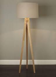 34 Wood Lamps You Ll Want To Diy Immediately Wooden Tripod Floor Lamp Floor Lamps Living Room Wood Lamp Design