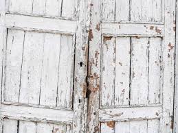 Paint the fronts of your cabinet doors and the faces of your drawers (don't forget the sides). Old White Painted Wooden Door Stock Photo Picture And Royalty Free Image Image 102428915