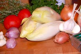 Geschmorte Brusseler Spitzen Mit Tomaten Chicoree Endives Belges Rezept Kochbar De