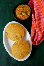 Masala Poori With Potato Curry A Tasty Breakfast Food Made With Whole Wheat Flour And Indian Spice Powders Puri Recipes Recipes Indian Food Recipes