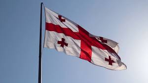 The current flag of georgia was adopted on may 8, 2003. Flag Of Georgia Free Footage In 2021 Georgia Flag Flag Georgia
