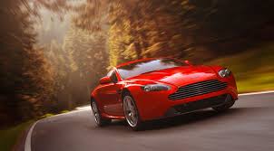 Image result for Magma Red 2012 Aston Martin