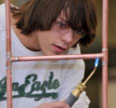 Attleboro High launches plumbing program to help prepare students for  career