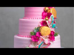 This allows the crumb coat to fully set before you apply the final coat of frosting. How To Make A 3 Tier Pink Loaded Cake Design Youtube