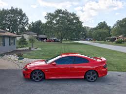 Image result for Bright Red 2004 Pontiac