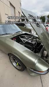 Image result for Jade Green 1959 Datsun