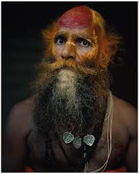 In the heart of Ayodhya, I met this incredible Sadhu standing like a  guardian of time, blessing everyone who passed. His silent presence felt  like a bridge between the ancient and the