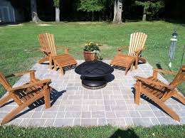 Our New 12x12 Paver Patio Space Completed This Weekend With Fire Pit And New Wooden Adirondack Chairs Amp Planter Patio Pavers Backyard Outdoor Patio Decor