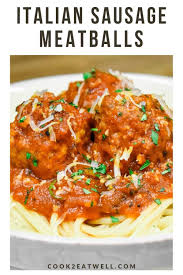 Use your hands to mix the ingredients together until they're just combined. These Italian Sausage Meatballs Are Cooked In A Tomato Sauce That S Made With Crushed Italian Sausage Recipes Ground Italian Sausage Recipes Sausage Meatballs