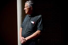 Father Dennis Morrow celebrates 40 years as priest, historian, police and  fire chaplain