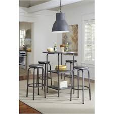 It features clean lines with a contemporary design to finish in the stunning stainless steel base. D560 12 Ashley Furniture Hattney Round Dining Room Bar Table