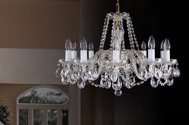 These are classic interiors where most people would imagine a crystal chandelier to be hung. Lamps And Chandeliers In The Living Room And Kitchen Luminaires And Lamps