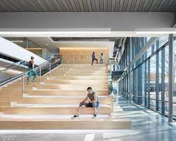 Health And Wellness Centers With Bright Hues Warm Textures And Spirited Design - Interior Design In 2021 Circular Buildings Design Firms Health And Wellness Center