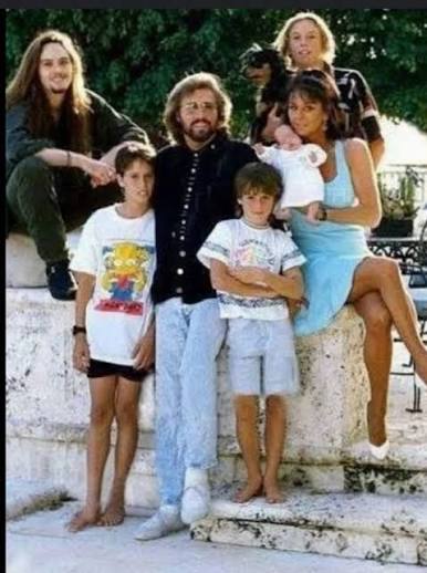 Barry Gibb with his family, including his wife Linda and their children.  "How Deep Is Your Love"