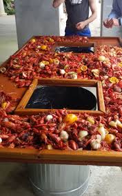 Crawfish In Louisiana Boiled With Potatoes Sausage Garlic Celery And Oranges Bonus Check Out The Awesom Crawfish Recipes Seafood Boil Recipes Crab Boil Party