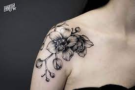 Hawaiian tribal orchid tattoos design. 30 Gorgeous Orchid Tattoo Designs And Ideas Tattoobloq Orchid Tattoo Small Shoulder Tattoos Flower Tattoo Shoulder