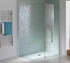 The master bathroom was over sized so we took space from the bedroom and closets to create a double vanity space with herringbone glass tile. Mosaic Tiles Shower Bathroom Shower Tile Ideas Interior Design Shower Tile Mosaic Shower Tile Bathroom Shower Tile