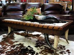 Top quality for your home. Cowhide Horn Coffee Table On Tri Color Cowhide Rug Rustic Living Room Seattle By Your Western Decor Houzz