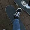 A skateboard is a short, narrow board with two small wheels attached to the bottom of either end. 3