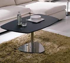 The soft lifting top gives the possibility to use the table both in the lower and in upper position, for breakfast, play, laptop and more. Coffee Table In Modern Design Ozzio Luxury Furniture Mr