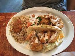 Cabo fish taco order online. Cabo Signature Beer Battered Shrimp Tacos With Baja Rice Picture Of Cabo Fish Taco Baja Seagrill Charlotte Tripadvisor