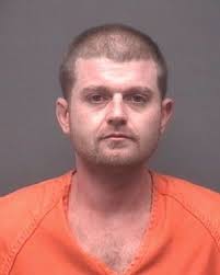 Formal charges filed against four in murder of man found at Alcoa