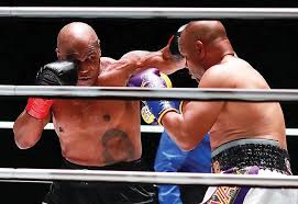 Mike tyson a opté pour un tatouage tribal plutôt original puisqu'il est situé tout autour de son œil gauche. Tyson And Jones Give Fight Winnings To Pandemic Victims Richmond Free Press Serving The African American Community In Richmond Va