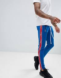 Free shipping & returns available. Boohooman Skinny Fit Tracksuit Bottoms With Taping In Blue Asos